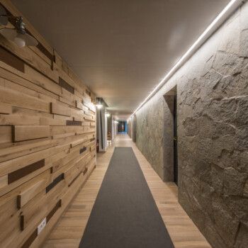 Long hallway and ceiling in modern hotel